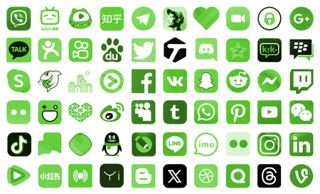 KYIV, UKRAINE - APRIL 1, 2024 Many icons of social media, messengers, video sharing platforms and other popular services and websites printed on white paper in green colorのeditorial素材