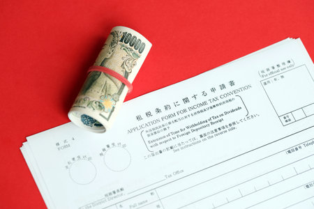 Japanese tax form 4 - Extension of time for withholding of tax on dividends with respect to foreign depositary receipt. Application form for income tax conventionの写真素材