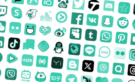 KYIV, UKRAINE - APRIL 1, 2024 Many icons of social media, messengers, video sharing platforms and other popular services and websites printed on white paper in turquoise colorのeditorial素材