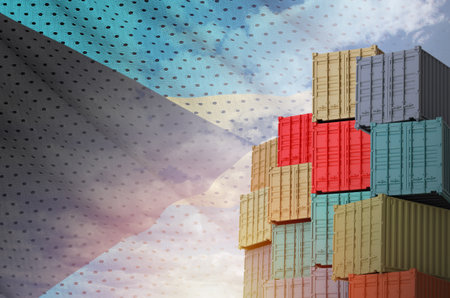 Bahamas flag and big stack of shipping cargo containers in docks with sky background close up