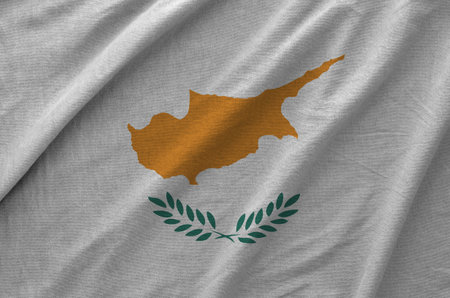 Cyprus flag depicted on folded wavy fabric of old cloth close upの写真素材