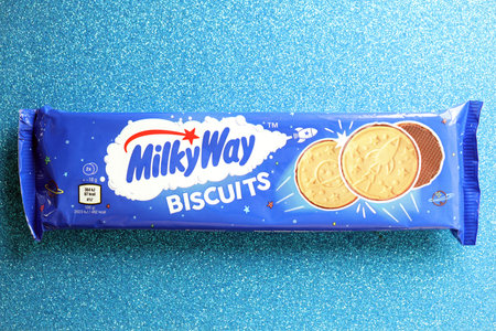 KYIV, UKRAINE - AUGUST 17, 2024 MilkyWay biscuits blue pack with original logo from famous...