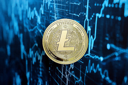 KYIV, UKRAINE - AUGUST 17, 2024 Litecoin LTC coin on abstract fictional cryptocurrency trading chart in blue color close upのeditorial素材