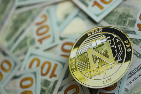 KYIV, UKRAINE - AUGUST 17, 2024 NEAR coin on big amount of hundred US dollar bills close upのeditorial素材
