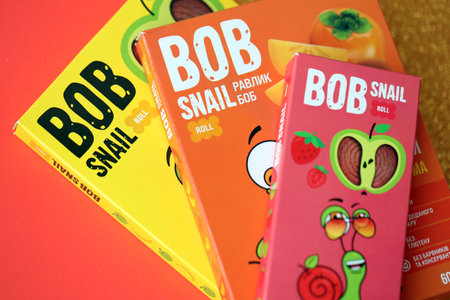 KYIV, UKRAINE - AUGUST 17, 2024 Bob snail candies packs with original logo close upのeditorial素材