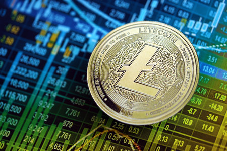 KYIV, UKRAINE - AUGUST 17, 2024 Litecoin LTC coin on cryptocurrency trading chart with calculations in different colors close upのeditorial素材