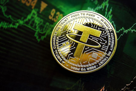 KYIV, UKRAINE - AUGUST 17, 2024 Tether USDT coin on dark cryptocurrency digital trading chart in green colors close upのeditorial素材