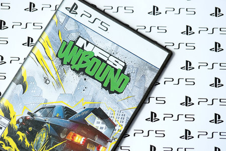 KYIV, UKRAINE - JUNE 26, 2024 Need For Speed Unbound PS5 video game disc box for console gaming. Popular video game disc close upのeditorial素材