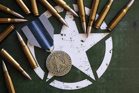 KYIV, UKRAINE - JULY 10, 2024 US Space Force Good Conduct medal. United States military award medal with ribbon and pin. Handmade paper theater props close upのeditorial素材