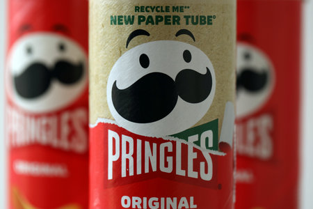 KYIV, UKRAINE - AUGUST 17, 2024 Pringles new cylinder pack with paper eco packaging without plastic close upのeditorial素材