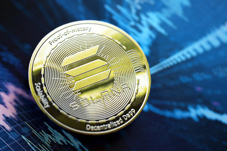 KYIV, UKRAINE - AUGUST 17, 2024 Solana SOL coin on abstract fictional cryptocurrency trading chart in blue color close upのeditorial素材