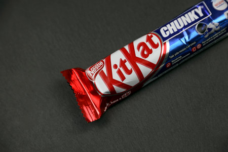 KYIV, UKRAINE - AUGUST 17, 2024 Kitkat chunky chocolate waffle bar in logo on wrapping close upのeditorial素材
