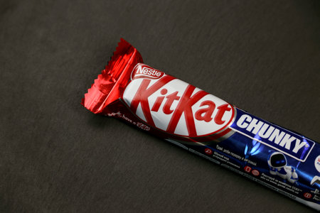 KYIV, UKRAINE - AUGUST 17, 2024 Kitkat chunky chocolate waffle bar in logo on wrapping close upのeditorial素材