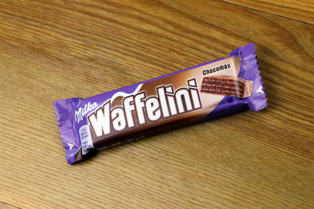 KYIV, UKRAINE - AUGUST 17, 2024 Milka waffelini chocolate product from famous manufacturer close upのeditorial素材