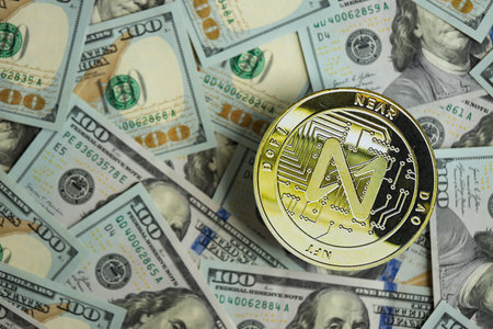 KYIV, UKRAINE - AUGUST 17, 2024 NEAR coin on big amount of hundred US dollar bills close upのeditorial素材
