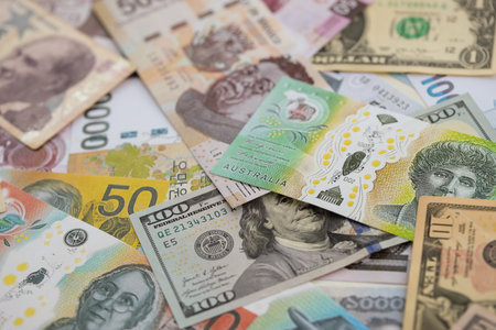 Big amount of money bills of different currencies and countries. Assortment background of international cash in big pile close upの写真素材