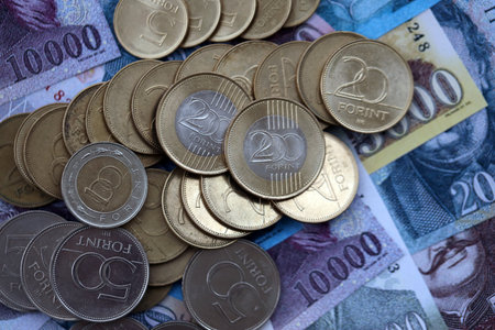 Stack of Hungarian Forint currency money bills and coins. HUF currency banknotes and coins close upの写真素材