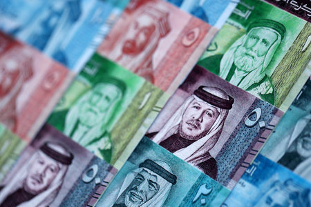 Jordanian Dinar currency money bills. JOD currency banknotes in pile with different denomination close upの写真素材