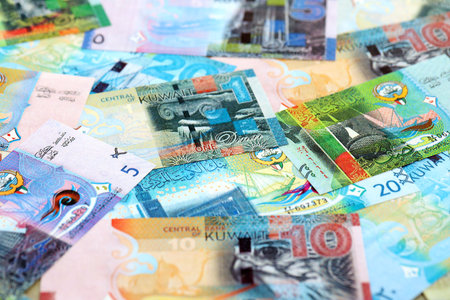 Kuwaiti dinar currency money bills. The current banknotes lies on table in big amount close up