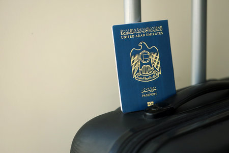 United Arab Emirates passport on travel luggage close up. The concept of travel and vacationの写真素材
