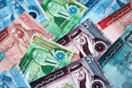 Jordanian Dinar currency money bills. JOD currency banknotes in pile with different denomination close upの写真素材