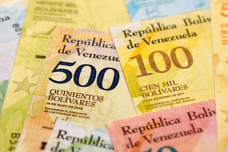 Venezuelan Bolivar currency money bills in pile. VED currency banknotes with different denomination close upの写真素材