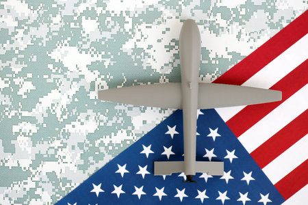 Drone unmanned autonomous technology. Toy uav drone on US flag close up