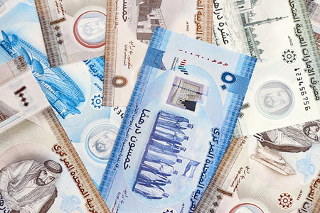 United Arab Emirates dirham currency money bills. The current banknotes lies on table in big amount close upの写真素材