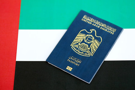 United Arab Emirates passport on flag close up. The concept of citizenshipの写真素材