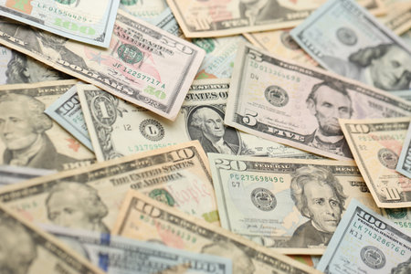 Stack of dollar bills. Hundred, fifty, twenty, ten, five dollars banknote close up viewの写真素材