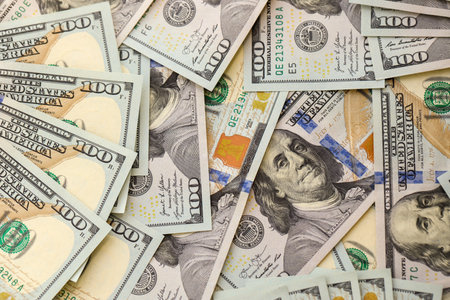 Background with money American hundred dollar bills. 100 dollar bills background close up