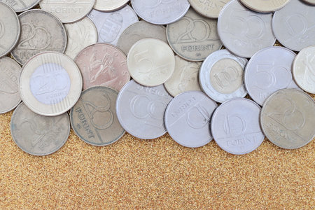 Many Hungarian forint coins in big stack close up. Forint is an official Hungarian currency instead euroの写真素材