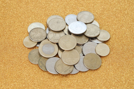 Many Hungarian forint coins in big pile close up. Forint is a Hungarian currency instead euro