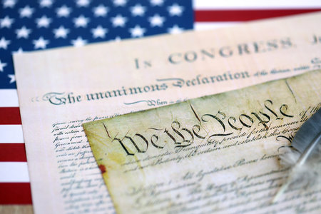 United States Bill of Rights Preamble to the Constitution and American Flag close upの写真素材