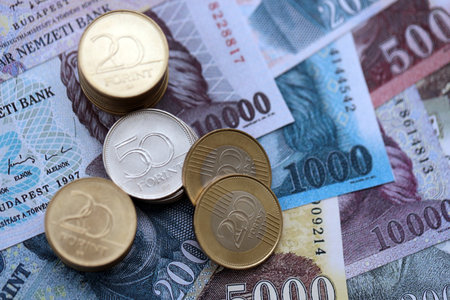 Large amount of Hungarian Forint currency money bills and coins. HUF currency banknotes and coins close upの写真素材