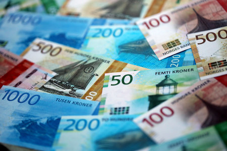 Norwegian Krone currency money bills. NOK currency banknotes in pile with different denomination close upの写真素材