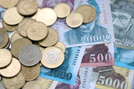 Hungarian Forint currency money bills and coins. Many HUF currency banknotes and coins close upの写真素材