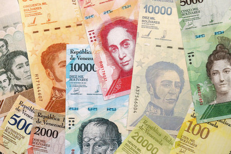 Venezuelan Bolivar currency money bills in big amount. Stack of VED currency banknotes with different denomination close upの写真素材