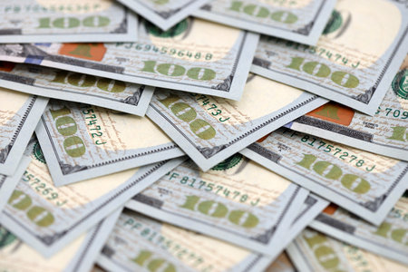 United States Dollar currency money bills. USD currency banknotes in stack with different denomination close upの写真素材