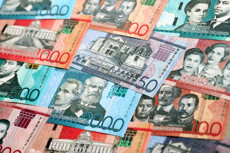 Dominican Republic Pesos currency money bills. DOP currency banknotes in bunch with different...