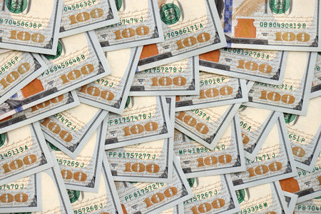United States Dollar currency money bills. USD currency banknotes in stack with different...