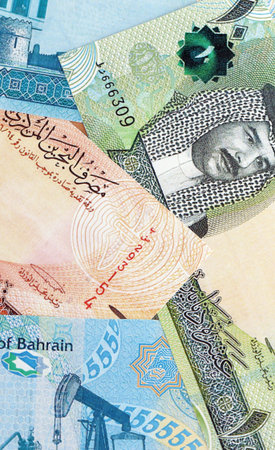 Bahraini dinar currency money bills. The current banknotes lies on table in big amount close upの写真素材
