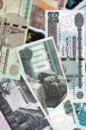 Egyptian pound currency money bills. The current banknotes lies on table in big amount close up