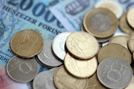 Stack of Hungarian Forint currency money bills and coins. HUF currency banknotes and coins close upの写真素材