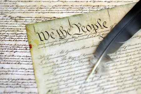 United States constitution first page in light brown tones close up. We The People of the United Statesの写真素材