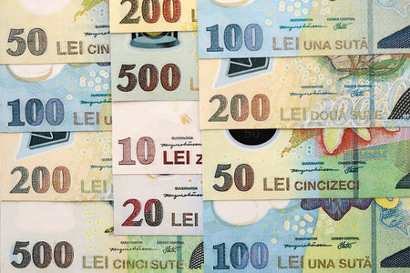 Romanian Leu currency money bills. RON currency banknotes in heap with different denomination close upの写真素材