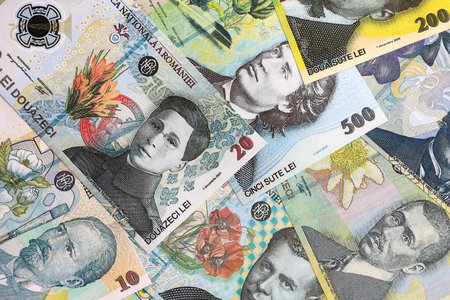 Romanian Leu currency money bills. RON currency banknotes in stack with different denomination close...