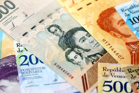 Venezuelan Bolivar currency money bills in big amount. Pile of VED currency banknotes with different denomination close upの写真素材