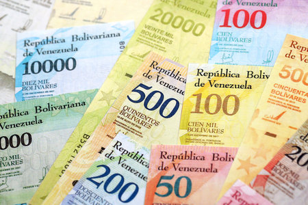 Venezuelan Bolivar currency money bills in big amount. Stack of VED currency banknotes with different denomination close upの写真素材