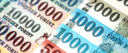 Hungarian Forints currency money bills in big amount. Pile of HUF currency banknotes with different denomination close upの写真素材